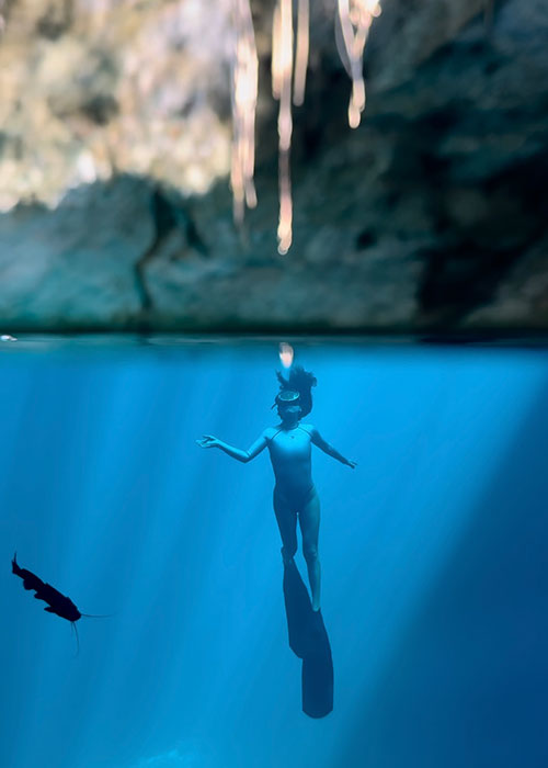 Split shot of a freediver taken with the Divevolk dome lens and SeaTouch 4 Max Plus iPhone housing